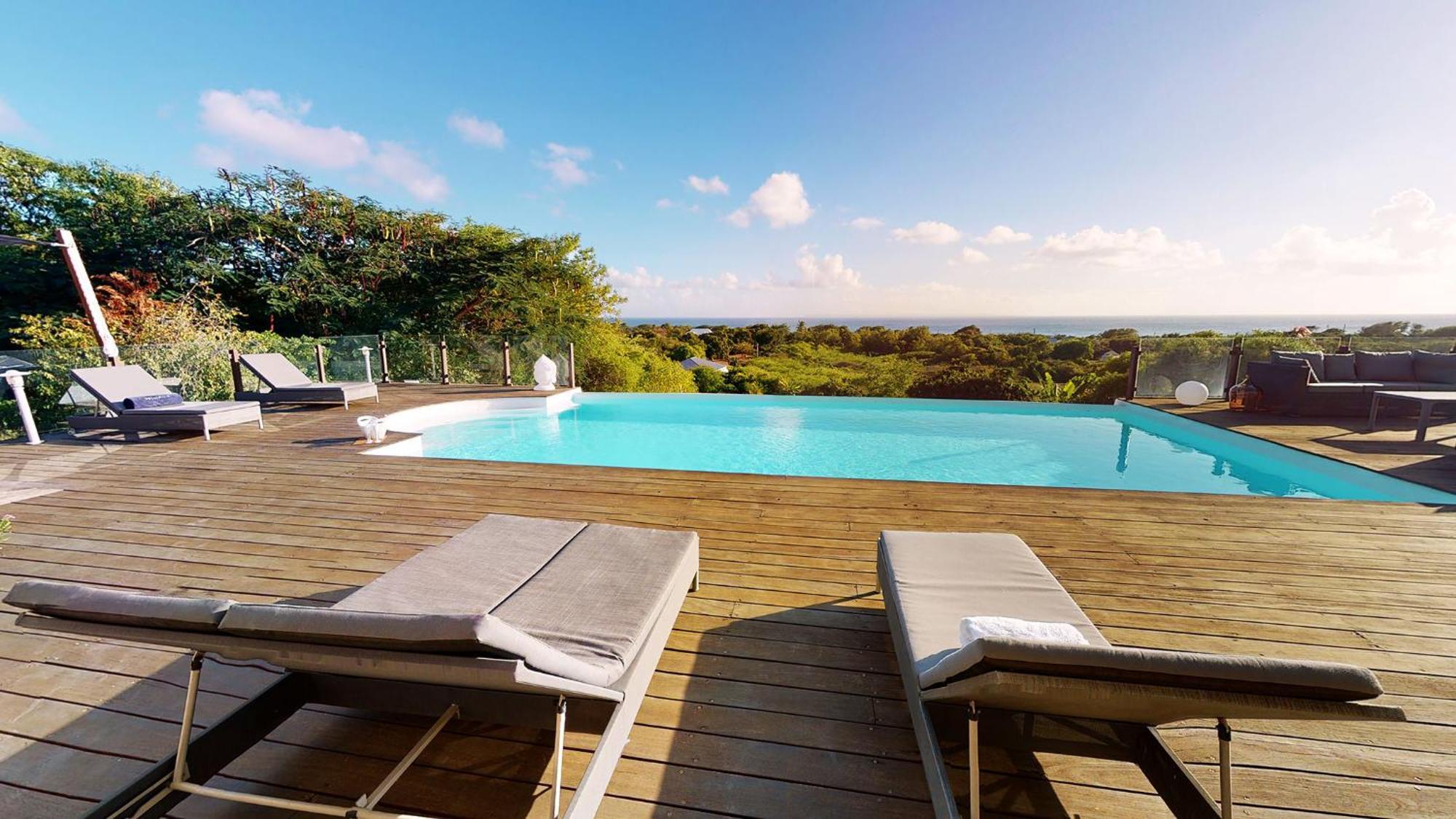 Villa Deluxe L'Hacienda Villa Vue Mer 180 Piscine Jacuzzi Proche Plage Marina Golf Pointe Des Chateaux Et Casino Jardin Clos Voyage Durable Saint-Francois  Rom bilde